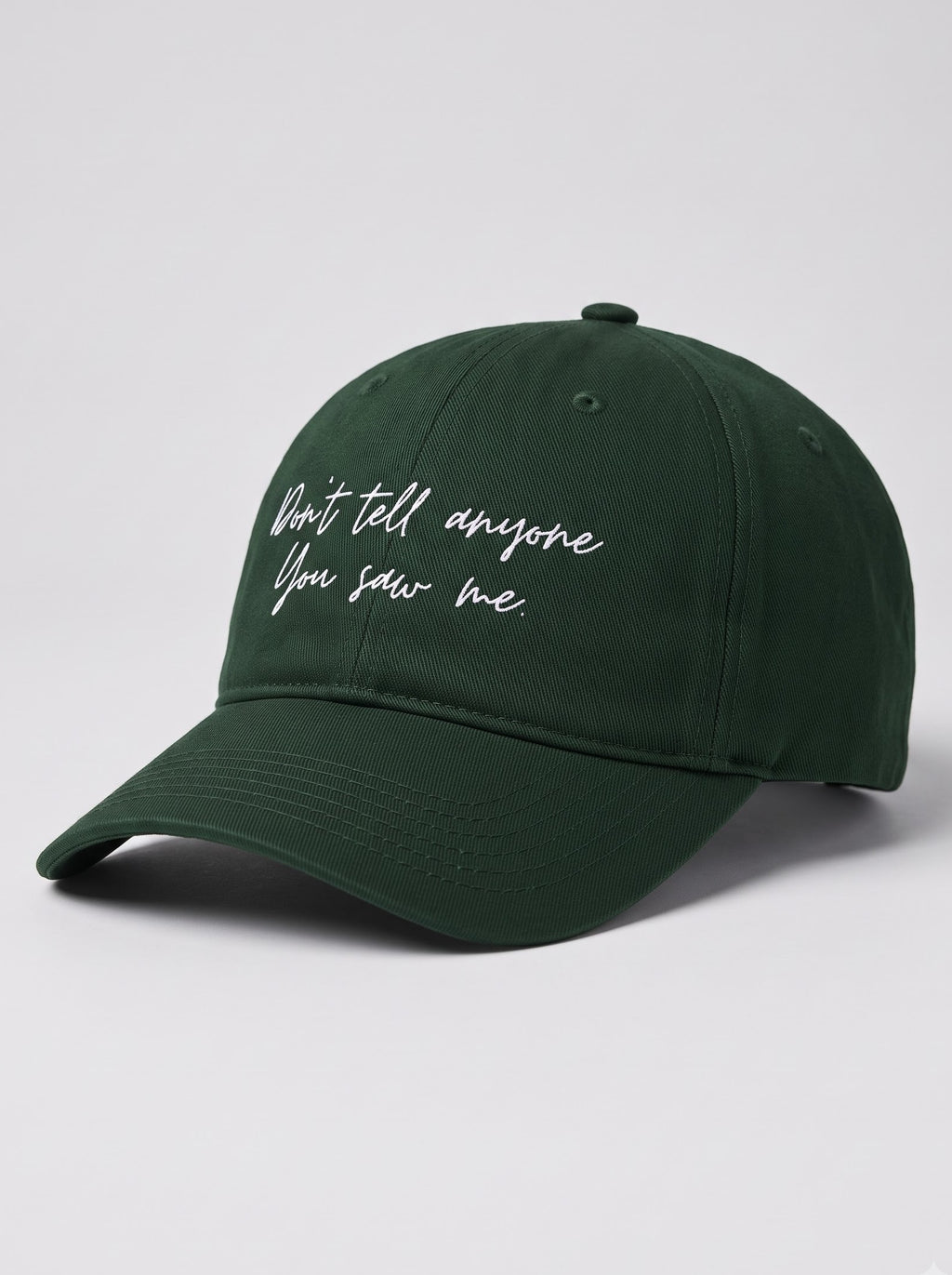 “Don’t Tell Anyone You Saw Me.” Embroidered Cap – Bottle Green