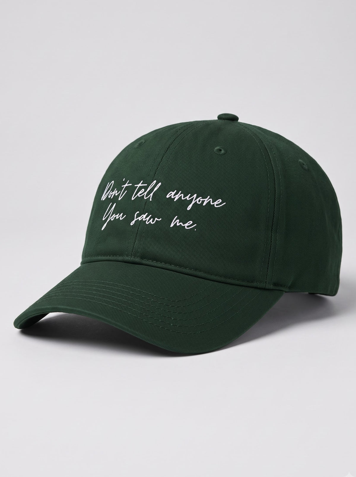 “Don’t Tell Anyone You Saw Me.” Embroidered Cap – Bottle Green