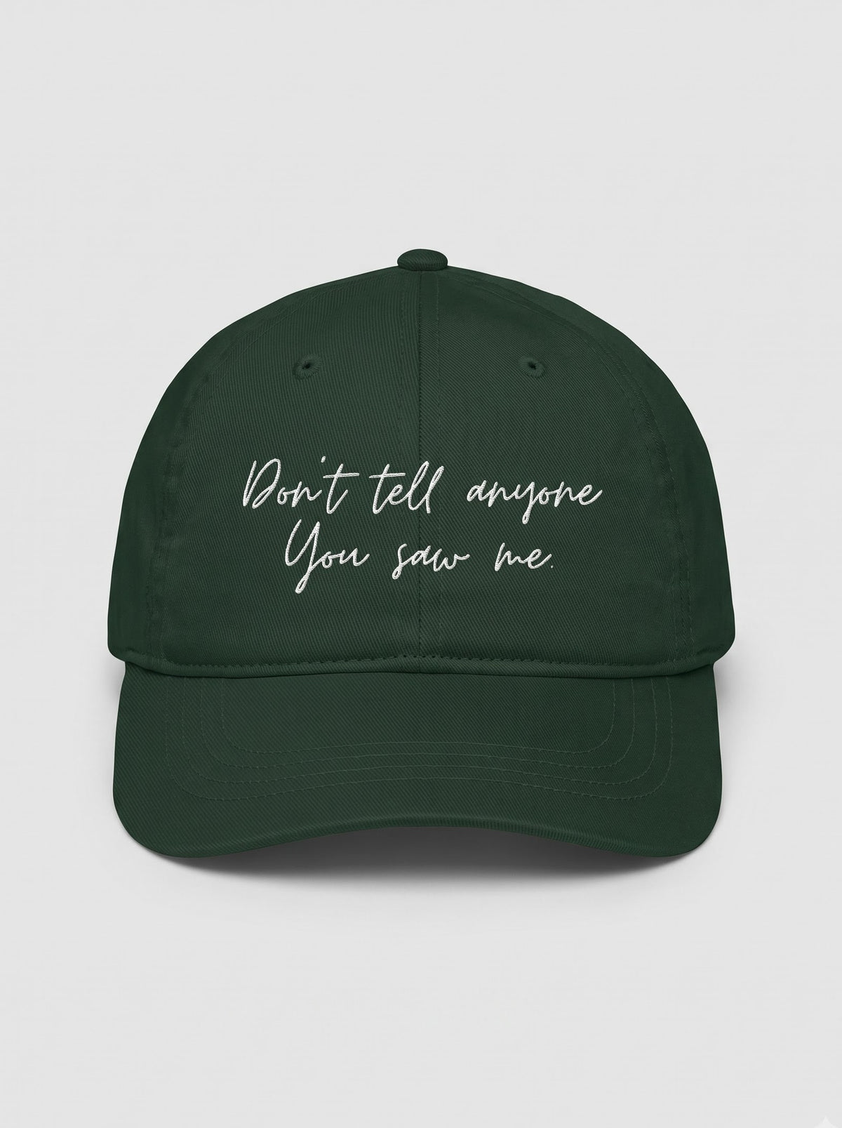 “Don’t Tell Anyone You Saw Me.” Embroidered Cap – Bottle Green