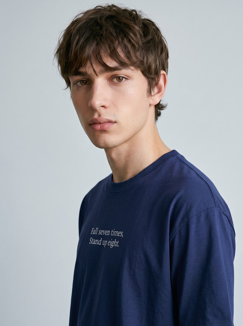 "Fall Seven Times, Stand Up Eight." T‑Shirt – Blue
