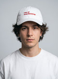 “CEO of Overthinking.” Embroidered Cap – White