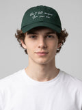 “Don’t Tell Anyone You Saw Me.” Embroidered Cap – Bottle Green