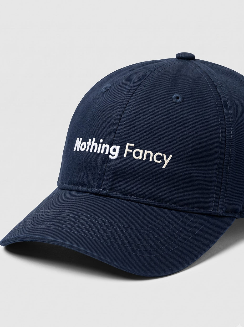 “Nothing Fancy” Minimal Embroidered Cap – Navy Blue