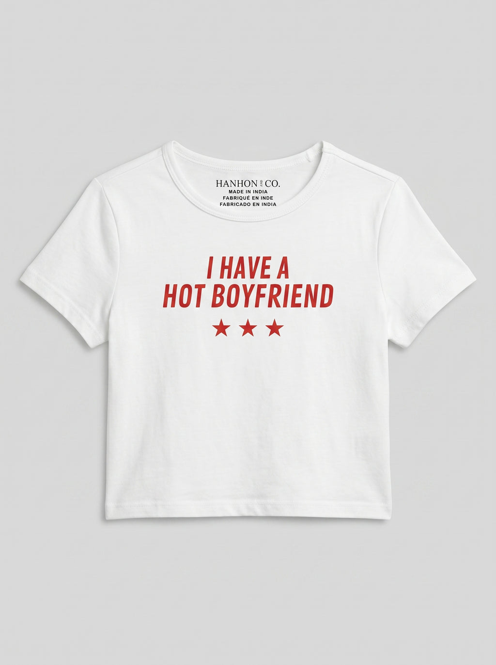 I HAVE A HOT BOYFRIEND – White Baby Tee