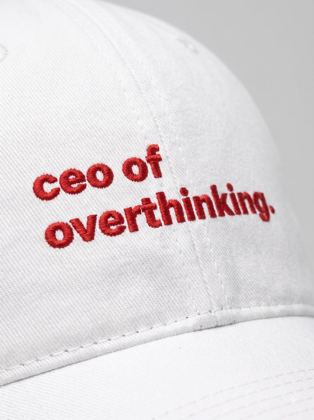 “CEO of Overthinking.” Embroidered Cap – White