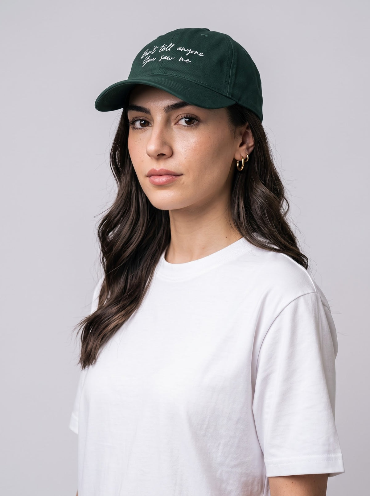 “Don’t Tell Anyone You Saw Me.” Embroidered Cap – Bottle Green