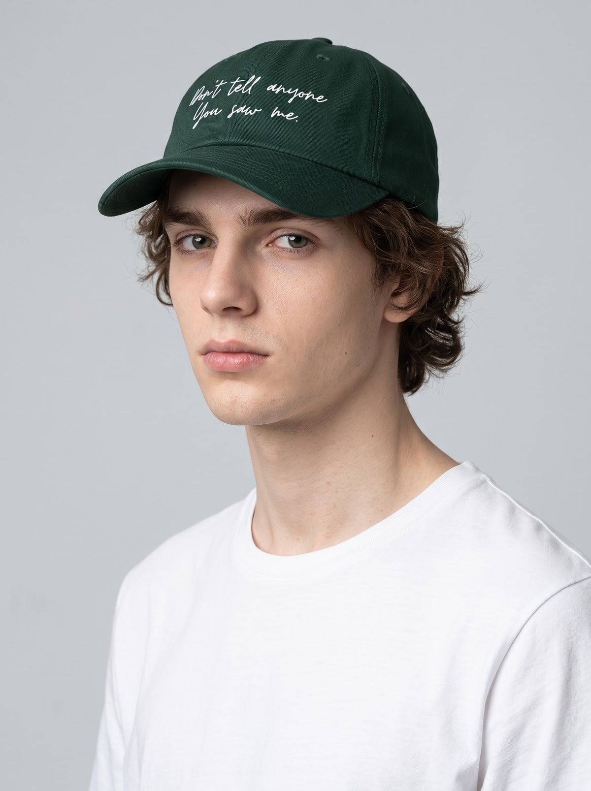 “Don’t Tell Anyone You Saw Me.” Embroidered Cap – Bottle Green